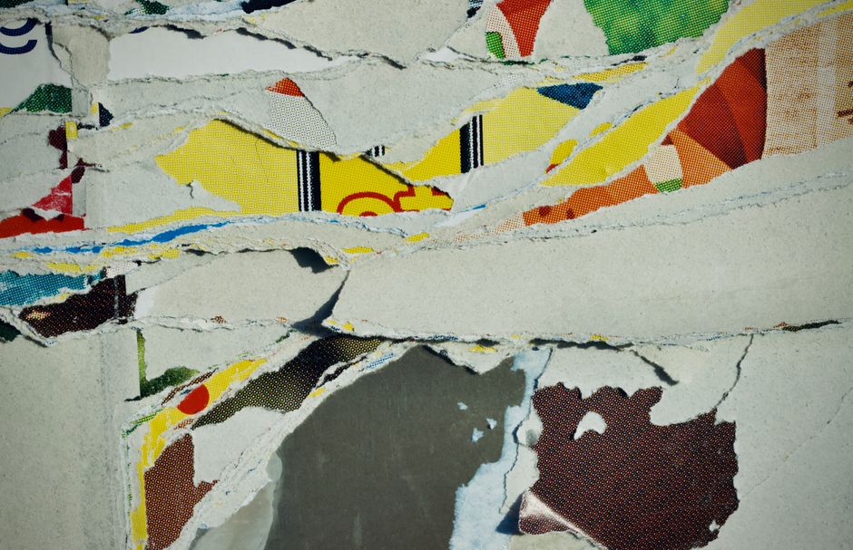 Contemporary abstract art depicting a collage of torn colorful paper layers for creative inspiration.
